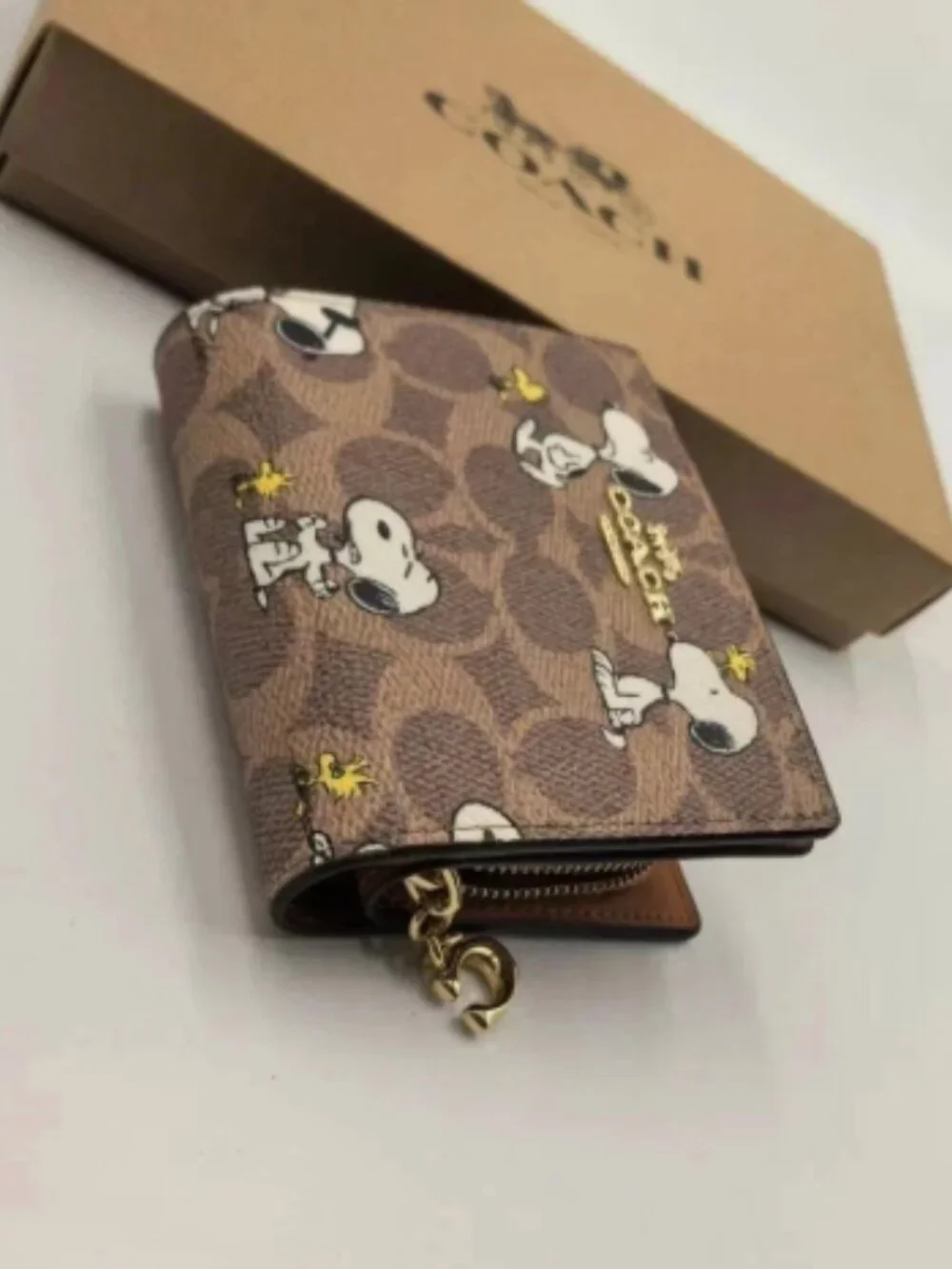 Coach X Peanuts Snap Wallet In Signature Canvas With Snoopy Print CBN32